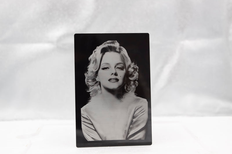 Laser engraving portrait on metal card